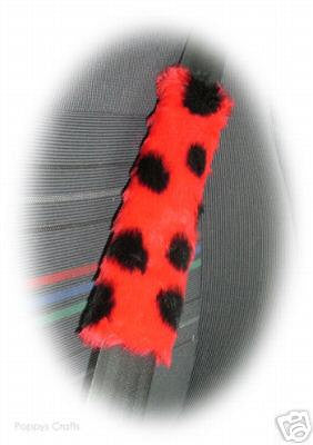 ladybird spotty fuzzy car seatbelt pads red and black 1 pair